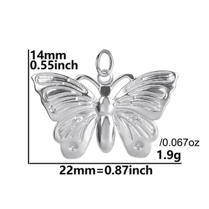 Silver butterfly pendant with detailed wings measuring 14mm by 22mm on a white background
