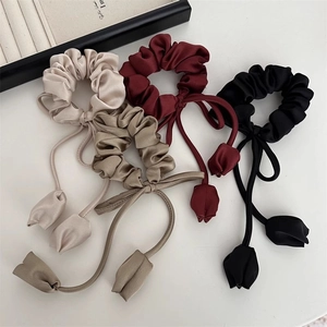 Elegant satin scrunchies with tulip pendants in four colors for women hair styling