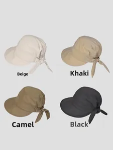 Detail view of bow sun hat in beige, khaki, camel, and black color options