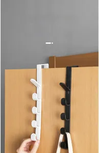 Close-up of over-the-door hooks for bags and coats with 5 vertical storage points