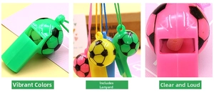 Detailed close-up of colorful football-shaped plastic whistles with matching lanyards