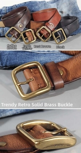 Detail of vintage genuine leather belts in four colors with solid brass buckle close-up
