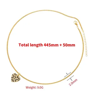 Golden heart pendant necklace with leopard pattern pave-set cubic zirconia on a cable chain