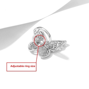 Detail of silver butterfly ring with micro-pave zircons and adjustable open band design