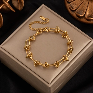 Minimalist 18K gold plated stainless steel bracelet with a stylish knot link design