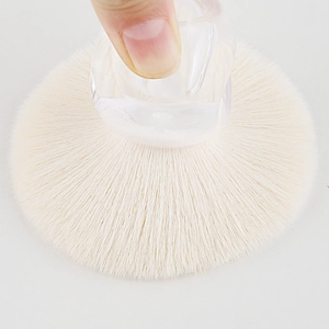 Fluffy loose powder brush with white bristles and transparent acrylic handle