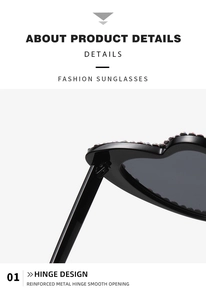 Close-up of reinforced metal hinges on heart-shaped sunglasses for smooth opening