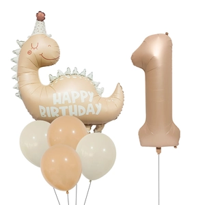 Detail of matte cream dinosaur and champagne gold number 1 balloon party set