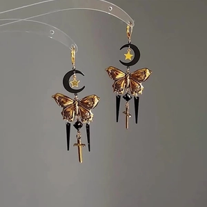 Vintage crescent moon and butterfly tassel earrings in black and gold gothic style