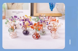 Macro detail of natural crystal money trees with colorful stones and glass bag base