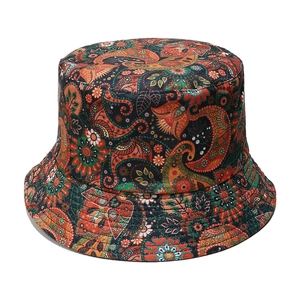 Detailed macro view of Paisley floral pattern and stitching on cotton bucket hat fabric