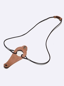 Detail of brown faux leather glasses lanyard with teardrop slide and metallic snaps