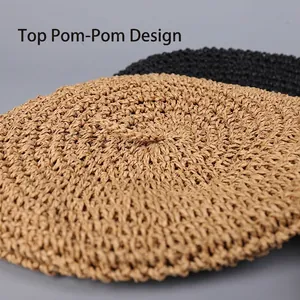 Handmade woven straw beret in khaki and black with a unique small ring top loop design