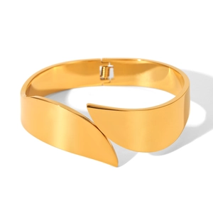 Minimalist wide two-tone stainless steel star bangle with a polished 18K gold finish