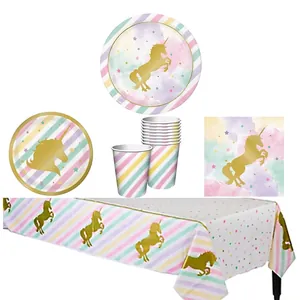 Unicorn themed party supplies set with gold foil plates, cups, napkins and tablecloth