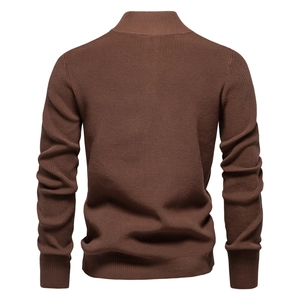 Detail of dark brown knit sweater with stand collar and fine ribbed texture back view