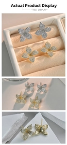 Detailed view of tulip flower stud earrings with AAA zircon pave and honeycomb metal back