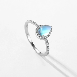 Elegant S925 sterling silver pear-cut moonstone ring with a halo of sparkling crystals