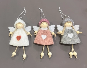 Three handmade knit Christmas angel ornaments in white pink and grey with wooden details
