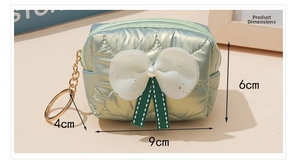 Detail view of light green quilted bow coin purse showing dimensions 9cm x 6cm x 4cm