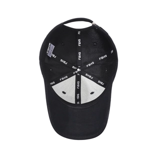 Interior view of black baseball cap showing reinforced seams and adjustable metal buckle