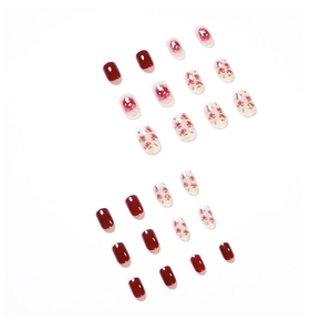 Short round red rose press-on nails set with elegant floral patterns and gradient design