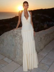 White halter deep V-neck maxi dress with twist detail and tiered ruffle cake skirt
