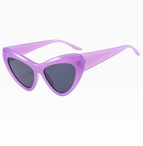 Detail of purple heart-shaped sunglasses with gray lenses and ZM3118 temple model marking