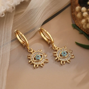 Orecchini a sole placcati oro 18K con occhio del diavolo in zircone blu e cristalli