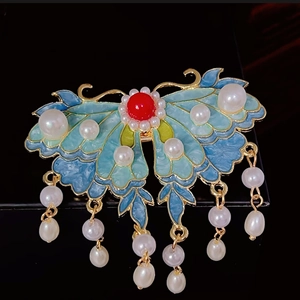Pince à cheveux papillon vintage avec émail bleu-vert, pierre rouge et pompons en perles