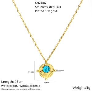 Detail view of 18k gold plated stainless steel necklace with turquoise evil eye pendant
