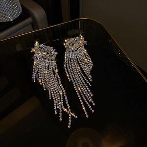 Elegant silver fan-shaped fringe earrings with white rhinestones and pearls