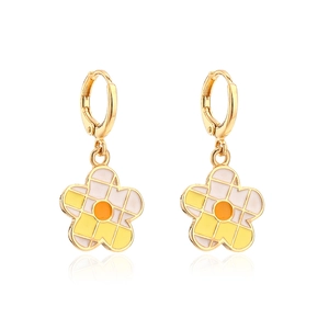 Detail of 18K gold plated hoop earrings featuring colorful enamel flower pendants