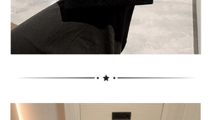 Detail of elegant black velvet evening clutch bag with star pattern chain strap