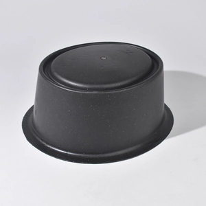 Macro shot of durable black PVC hat support base with fine matte texture and ringed flange