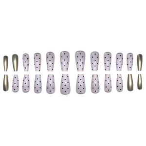 Press-on coffin nails set with nude pink base, black polka dots and metallic gold finish