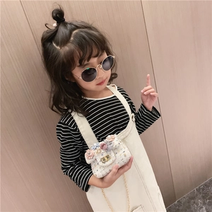 Mini tweed crossbody bag for girls with floral accents and elegant gold chain strap