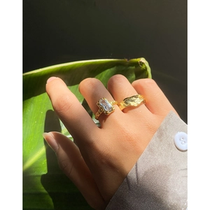 French vintage gold ring set with rectangular zircon and molten lava textured band