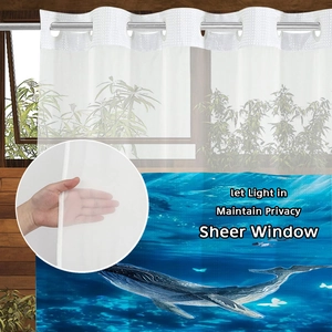 Sheer ocean theme shower curtain with blue whale print and silver metal eyelets