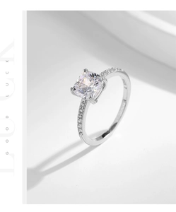 Macro shot of S925 sterling silver ring featuring a cushion-cut cubic zirconia stone