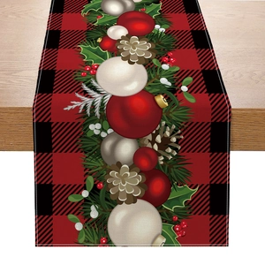 Polyester table runner with red black plaid pattern and festive Christmas wreath motif