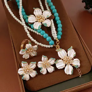 Bijoux Fleur Alliage Émail Strass Künstliche Perle Fantaisie Künstliche Perle Turquoise Collier Boucles Oreilles Tige Argent Bague Broche