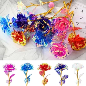 Detail view of colorful holographic roses with gold stems in five vibrant colors