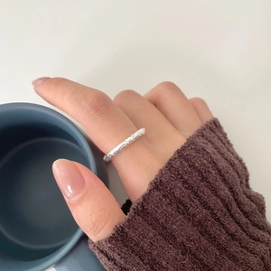 Handcrafted irregular hammered 925 sterling silver ring with molten lava texture