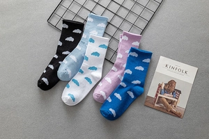 Detailed flat lay of five pairs of cotton socks with cloud patterns in various colors