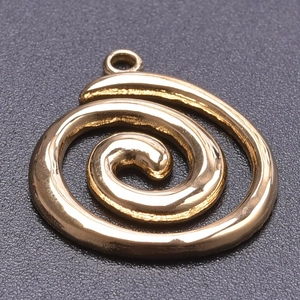 Macro shot of 18k gold plated 304 stainless steel spiral pendant for jewelry making