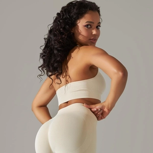 Close-up of the ribbed knit fabric texture on this seamless cream yoga sports set