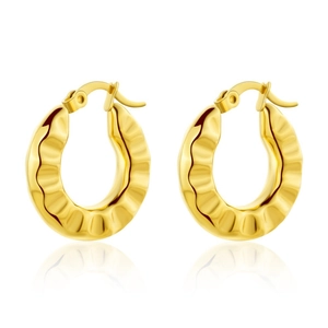 Minimalist golden hoop earrings with irregular textured hammer finish on white background