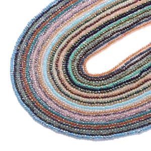 Macro shot of 2mm multi-colored faceted glass beads arranged for DIY jewelry making