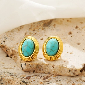 Vintage oval turquoise earrings with 18K gold plated spiral edges on natural stone
